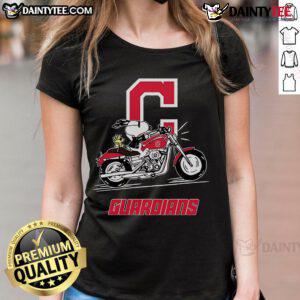 Alt Text: Snoopy and Woodstock riding a motorbike on a Cleveland Guardians ladies tee, perfect for fans and stylish outfits.