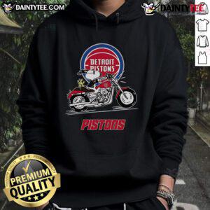 Snoopy and Woodstock joyfully riding a motorbike in a Detroit Pistons hoodie, showcasing fun cartoon style and team spirit.