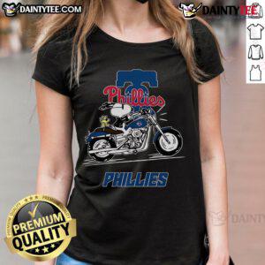 Snoopy and Woodstock riding a motorbike on a Philadelphia Phillies ladies tee, perfect for fans and casual wear.
