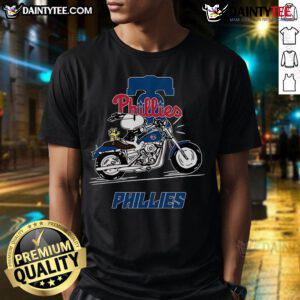 Good Snoopy and Woodstock riding a motorbike on a Philadelphia Phillies T-shirt design, perfect for fans.