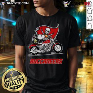 Alt Text: Snoopy and Woodstock riding a motorbike on a Tampa Bay Buccaneers T-shirt, showcasing team spirit and fun.