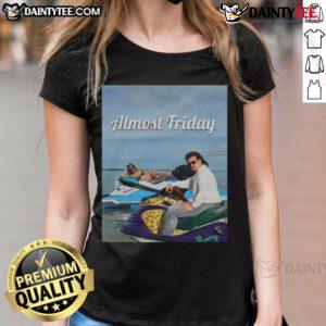 Stylish 'Nice Almost Friday' Sweeney and McBride ladies tee in vibrant colors, perfect for casual outings or weekend vibes.