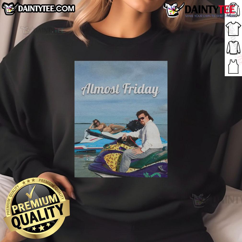 Cozy 'Nice Almost Friday' Sweeney and McBride sweatshirt, perfect for casual outings and relaxed weekends.