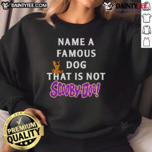 Alt Text: Cozy sweatshirt featuring a famous dog design, perfect for fans of pet apparel, not Scooby-Doo.
