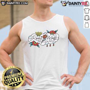 Remi Wolf wearing a colorful flower tank top, showcasing vibrant style and summer fashion trends.
