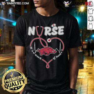 Official Arkansas Razorbacks Nurse 'It's A Work Of Heart' T-Shirt featuring logo, perfect for fans and healthcare workers.