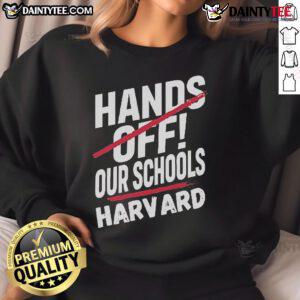 Alt Text: I Stand With Harvard Hands Off Anti-Trump Sweatshirt featuring bold text and a stylish design in a casual setting.