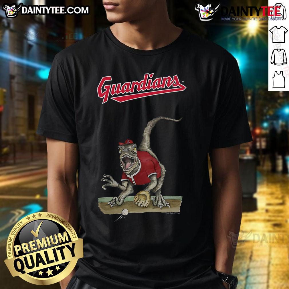 Alt Text: Awesome Cleveland Guardians Tiny Turnip Velociraptor T-Shirt featuring a playful dinosaur design for fans.