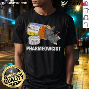 Alt Text: Cute black cat in pharmacist attire on a t-shirt, perfect for cat lovers and pharmacy enthusiasts.