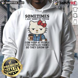 Alt Text: Cute Hello Kitty hoodie with a whimsical quote about throwing cow poop for growth and humor.