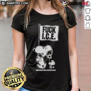 Cute Snoopy and Woodstock graphic on a flag tee, featuring 'Fck Ice' and 'Immigrants Make America Great' slogan.