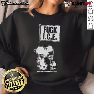 Cute Snoopy and Woodstock on a sweatshirt with 'Fck Ice, Flag Immigrants, Make America Great' design.