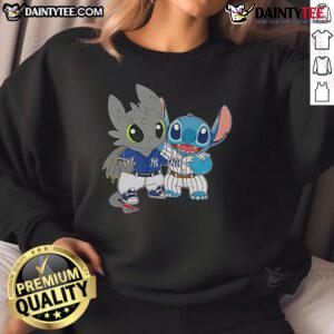 Cute Stitch and Toothless New York Yankees sweatshirt featuring vibrant colors and playful design, perfect for fans.