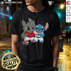 Alt Text: Cute Stitch and Toothless graphic on a Philadelphia Phillies t-shirt, perfect for fans and Disney lovers alike.