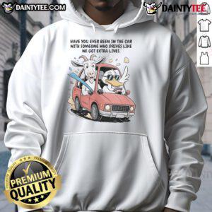 Funny goat and duck in a car wearing Extra Life hoodie, showcasing quirky animal friendship and playful driving antics.