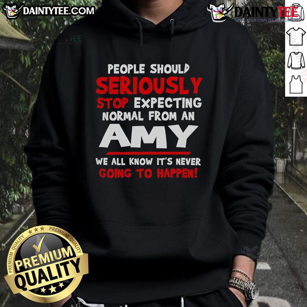 Funny people wearing 'Seriously Stop Expecting Normal' Amy hoodie, showcasing humor and individuality in casual fashion.
