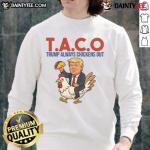 Funny Taco Trump sweatshirt featuring a cartoon of Trump hesitating to ride a chicken, capturing humorous political satire.
