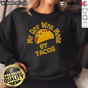 Cozy sweatshirt featuring 'Good, My Day Was Made By Tacos' design, perfect for taco lovers and casual wear enthusiasts.