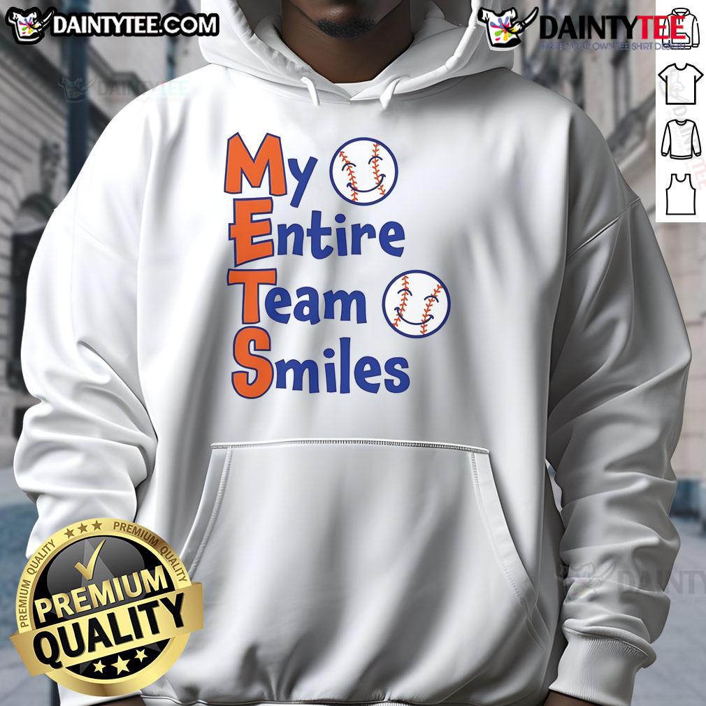 Happy Mets team members wearing baseball hoodies, all smiling together in a joyful celebration.