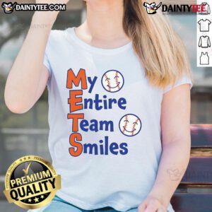 Happy Mets team smiles together in baseball ladies tee, showcasing team spirit and camaraderie on the field.