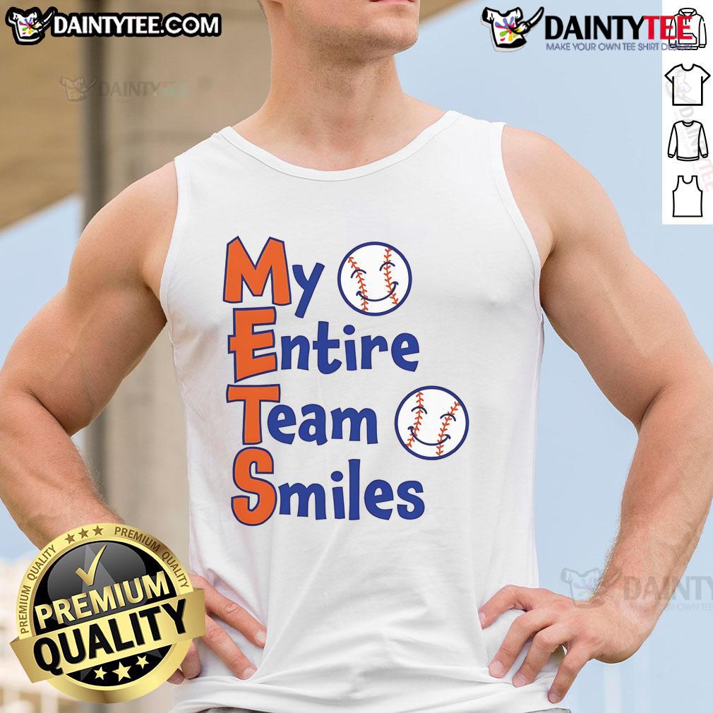 Alt Text: Happy Mets team smiles in baseball tank tops, showcasing team spirit and camaraderie on the field.