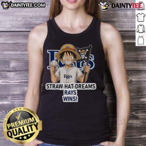 Happy Tampa Bay Rays fan wearing a Monkey D. Luffy tank top, celebrating dreams and victories at the game.