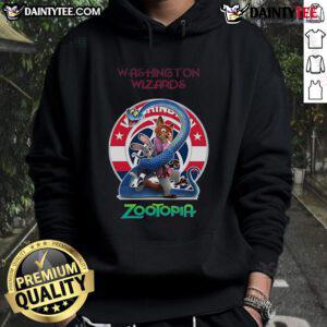 Happy fan wearing a Washington Wizards Zootopia 2 hoodie, showcasing team spirit and vibrant design at a game.