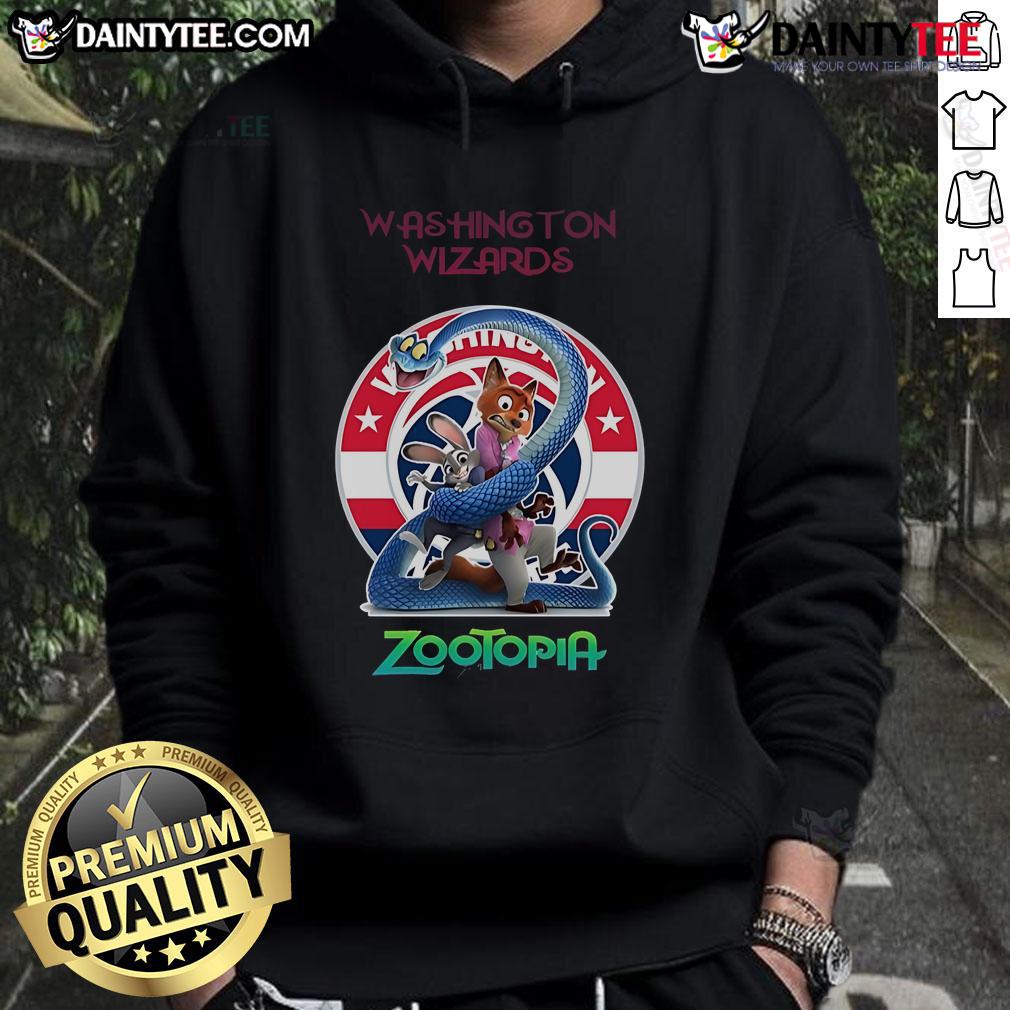 Happy fan wearing a Washington Wizards Zootopia 2 hoodie, showcasing team spirit and vibrant design at a game.