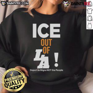 Hot ICE Out Of LA sweatshirt featuring 'Deport LA, Migra Not The People' slogan, promoting immigration rights and activism.