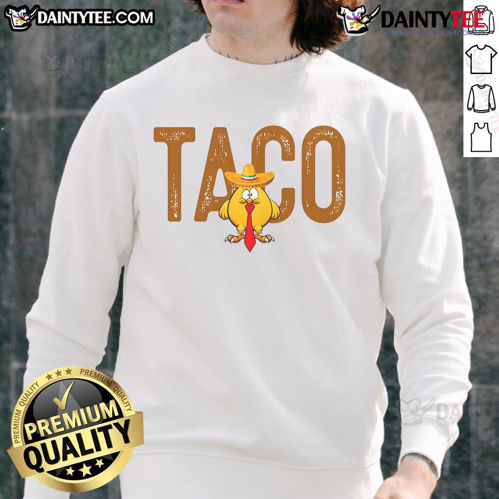 Funny sweatshirt featuring 'Hot Taco Trump Always Chickens Out' graphic, perfect for humor and political satire lovers.