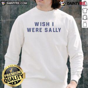 Conan Gray in a 'Wish I Were Sally' sweatshirt, stylishly showcasing his unique fashion and personality.