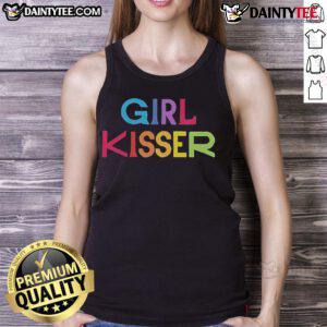 Nice girl in red tank top kisses her friend, showcasing a vibrant summer style and playful friendship vibes.