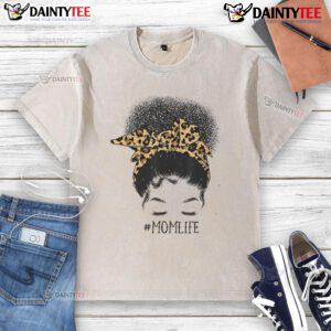 Awesome Afro Mom in a messy bun wearing a leopard print t-shirt, celebrating Black Mom life for Mother's Day.