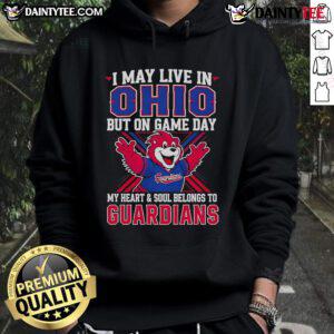 Fan wearing a Cleveland Guardians hoodie, showcasing team spirit on game day in Ohio.