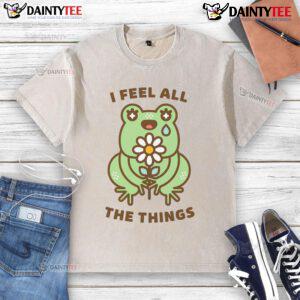 Alt Text: Cute neurodivergent emotional frog graphic on a washed t-shirt, perfect for expressing feelings and individuality.