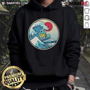 Alt Text: Cute Pokemon Squirtle surfing a wave on a hoodie, perfect for fans of Pokemon and beach vibes.
