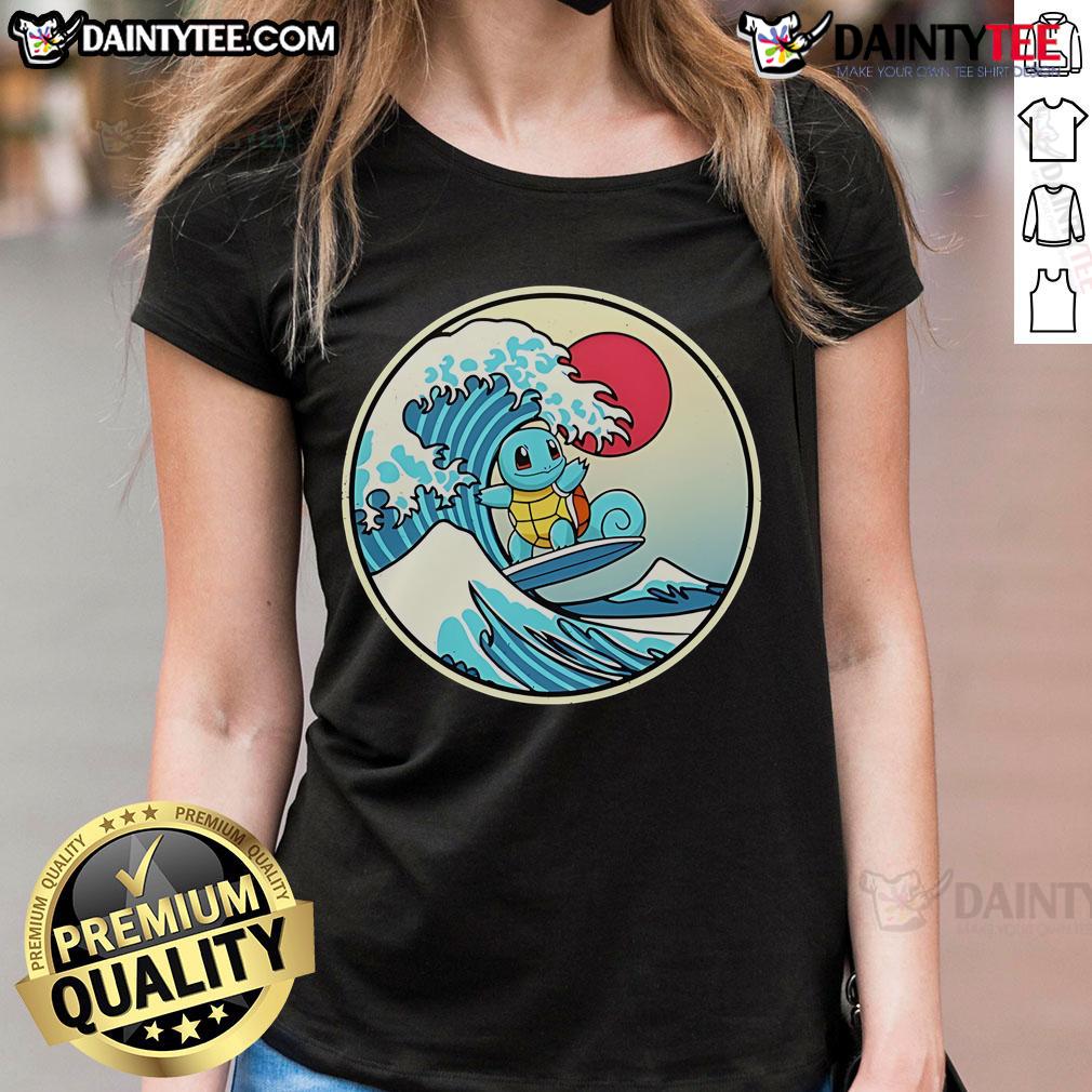 Cute Pokmon Squirtle surfing a wave on a ladies tee, perfect for fans of whimsical and fun Pokmon apparel.
