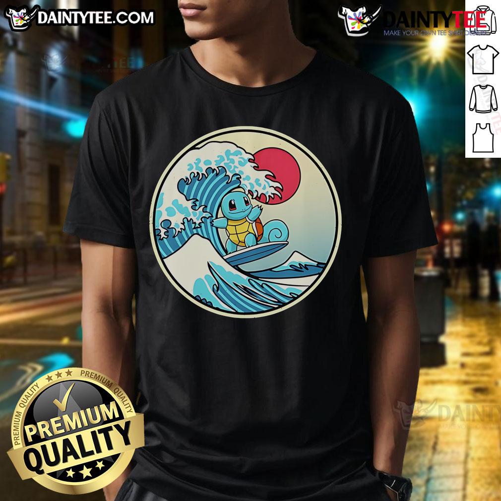 Alt Text: Cute Pokmon Squirtle surfing a vibrant water wave on a stylish t-shirt, perfect for Pokmon fans and beach lovers.