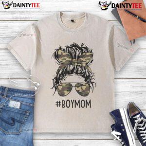 Mom of boys with a messy bun, wearing a funny washed t-shirt, embracing the joys of motherhood and mom life.