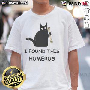 Alt Text: Funny cat wearing a shirt that says 'I Found This Humerus' showcasing humor and creativity in pet apparel.