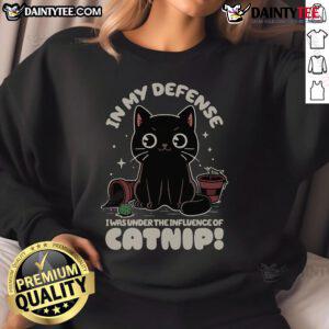 Funny cat sweatshirt featuring a playful cat with the phrase 'In My Defense, I Was Under The Influence Of Catnip.'