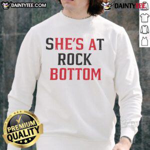 Funny She's at Rock Bottom, He's a Bottom sweatshirt featuring a humorous design for casual wear.