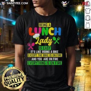 Funny 'Good Being A Lunch Lady Is Easy It's Like Riding A Bike Except The Bike Is On Fire' T-Shirt design.