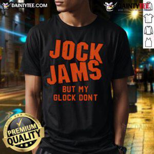 Good Jock Jams But My Glock Don't T-Shirt featuring bold graphic text on a casual black tee, perfect for music and gun enthusiasts.