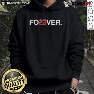 Chicago Cubs players wearing FO23VER hoodies, showcasing team spirit and style in a vibrant game day setting.