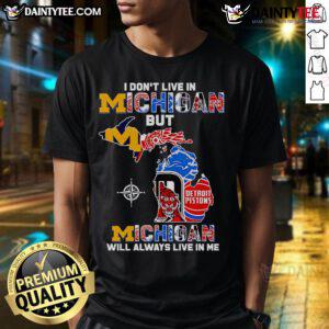 Alt Text: Official 'I Don't Live In Michigan But Michigan Will Always Live In Me' T-Shirt featuring a vibrant design and bold text.