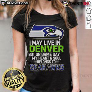 Seattle Seahawks ladies tee celebrating fandom with Denver backdrop, perfect for game day spirit and style.