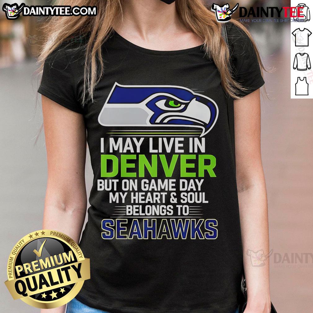 Seattle Seahawks ladies tee celebrating fandom with Denver backdrop, perfect for game day spirit and style.