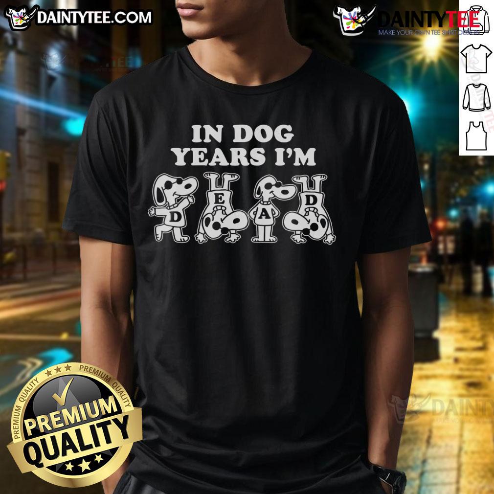 Awesome Snoopy In Dog Years I'M Dead T-Shirt featuring a playful Snoopy graphic, perfect for Peanuts fans.