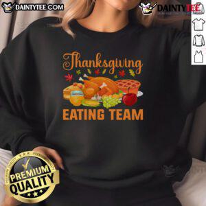 Awesome Thanksgiving Eating Team sweatshirt featuring food lovers enjoying a festive turkey day feast.